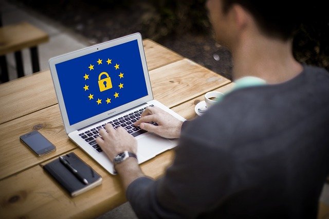Man in front of a laptop